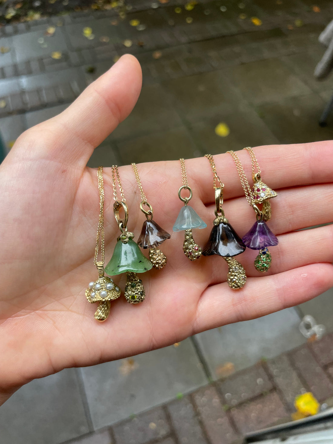 Hand-carved  crystal mushroom necklaces in 14k gold by Martina Kocianova