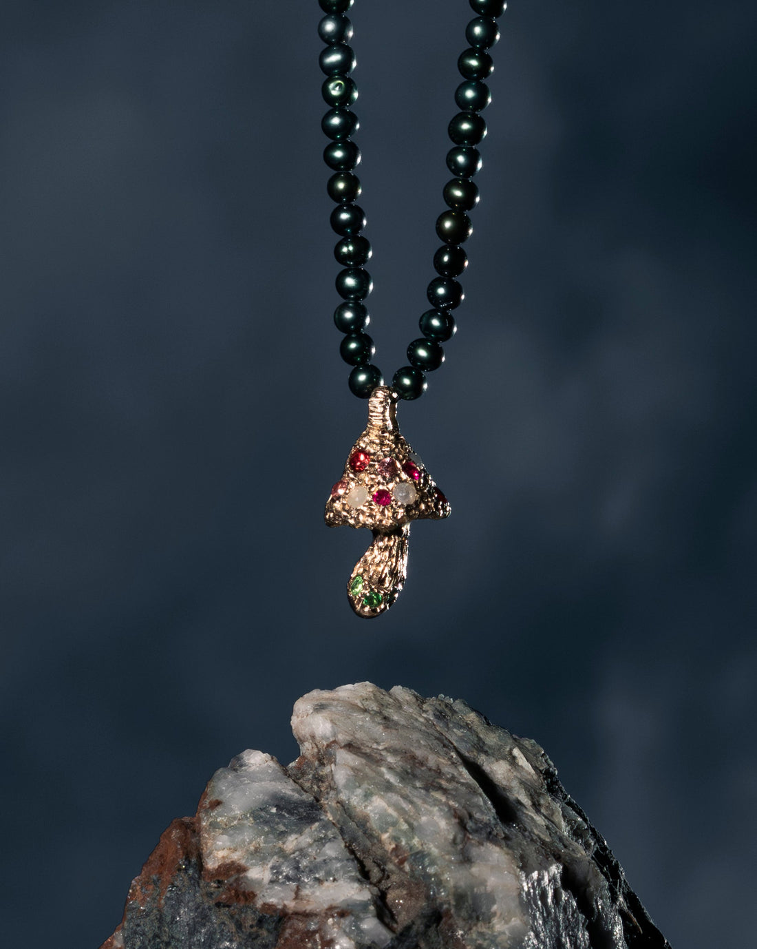 Hand-carved mushroom pendant in 14k gold by Martina Kocianova