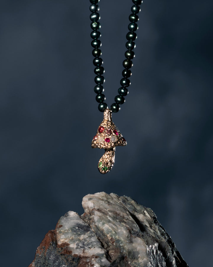 Hand-carved mushroom pendant in 14k gold by Martina Kocianova