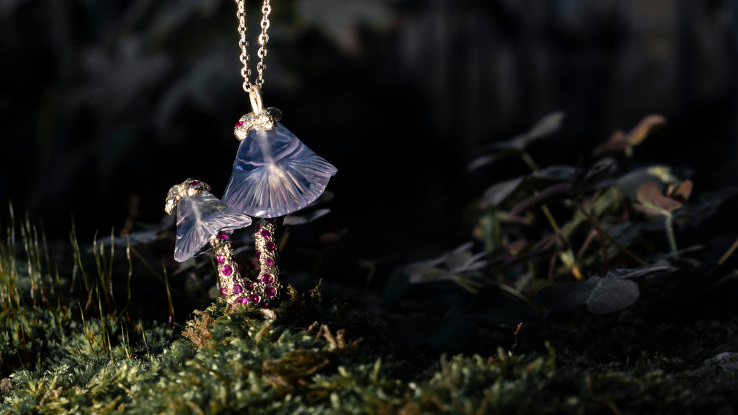 Necklace with a pendant on grass
